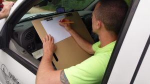 Josh sketching data map in truck